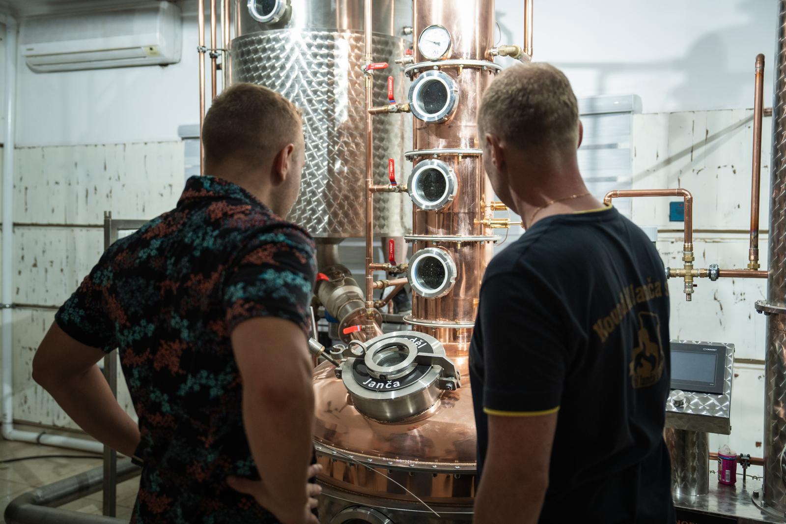 Copper still and stainless-steel tanks of the fruit distillery